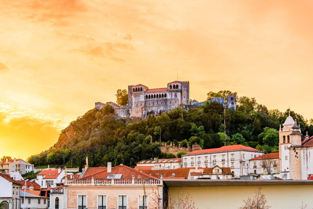 The historic castelo de Leiria at sunset for Leiria cannabis travel Guide CannaTrailz