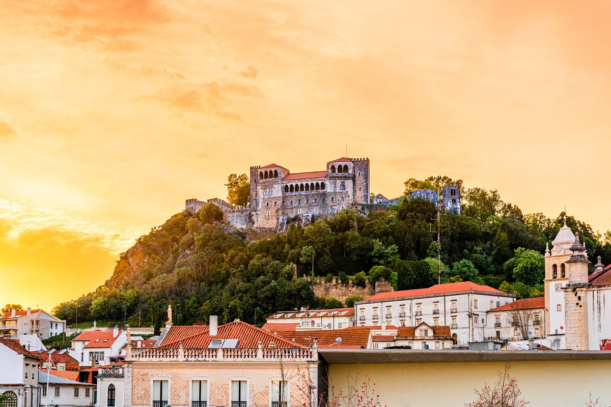 The historic castelo de Leiria at sunset for Leiria cannabis travel Guide CannaTrailz