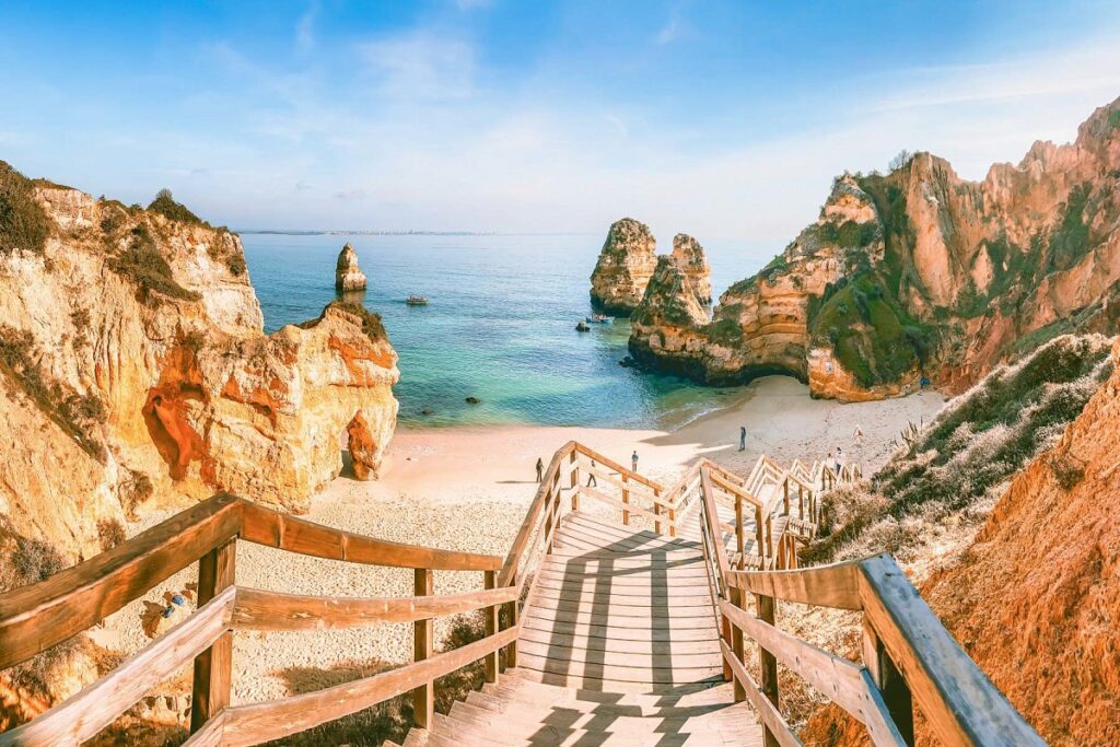 Praia do Camilo beach in Lagos, Portugal for cannabis travel Guide cannatrailz