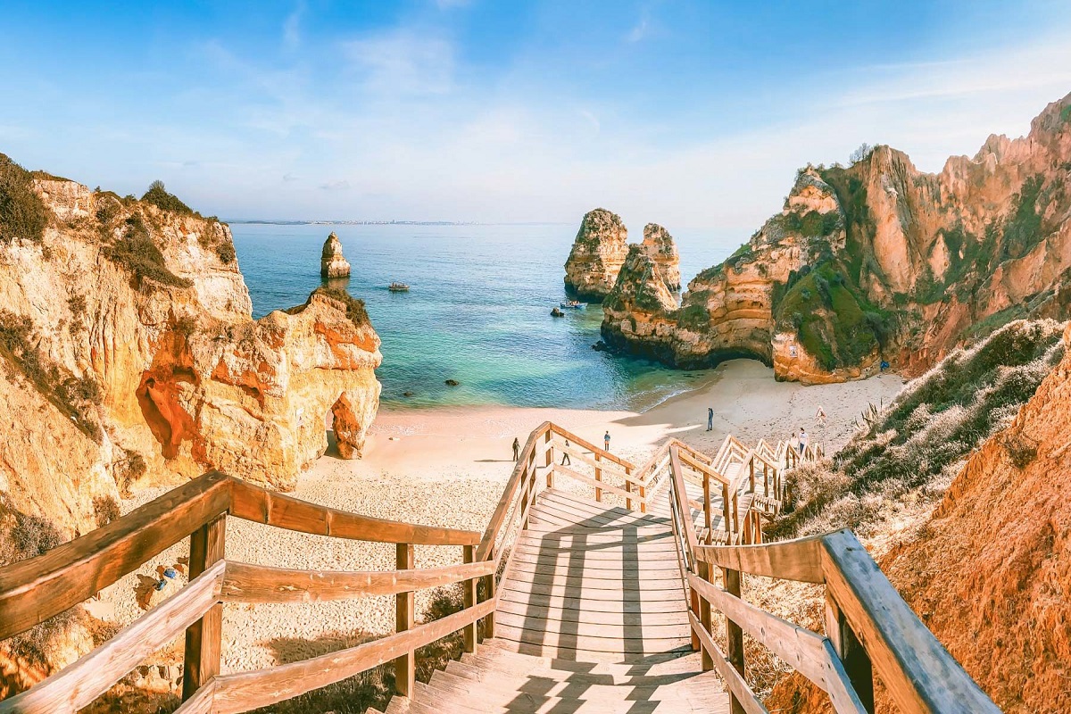 Praia do Camilo beach in Lagos, Portugal for cannabis travel Guide cannatrailz