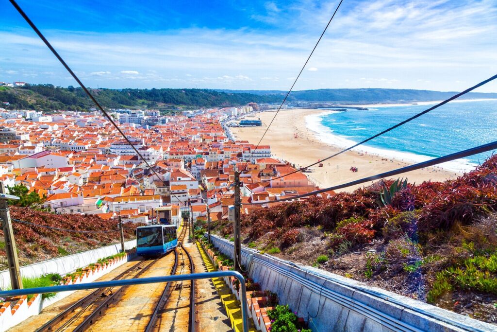 The Nazare funicular railway connects to the lower beach town for Nazare cannabis travel guide CannaTrailz