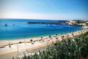 Praia Vasco da Gama, city center and Port on a sunny day for Sines cannabis travel guide CannaTrailz