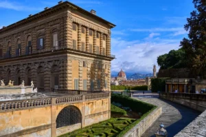 View of Palazzo Pitti, Boboli Gardens and Duomo with blue skies on a sunny day in Florence, Tuscany, Italy.