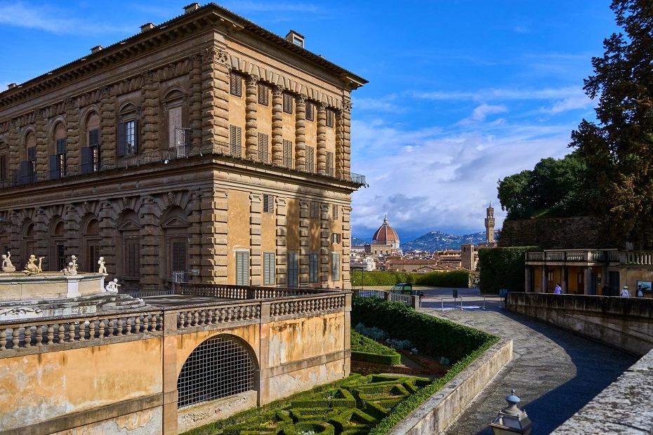 View of Palazzo Pitti, Boboli Gardens and Duomo with blue skies on a sunny day in Florence, Tuscany, Italy.