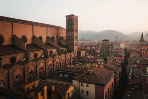 Aerial view showing signature rusty red architecture in Bologna, Italy.
