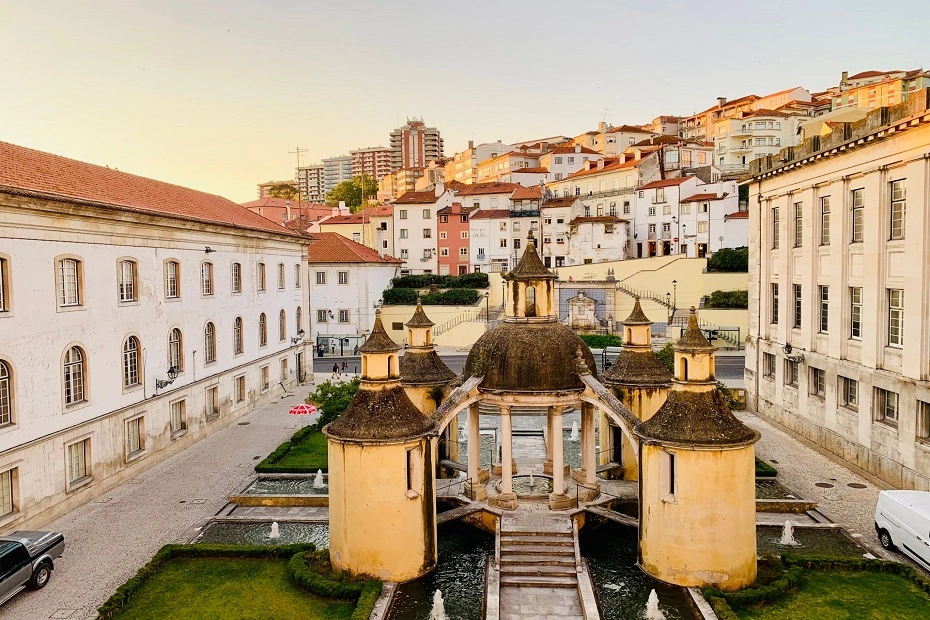 Renaissance architecture glow during sunset at Jardim de Manga in Coimbra, Portugal.