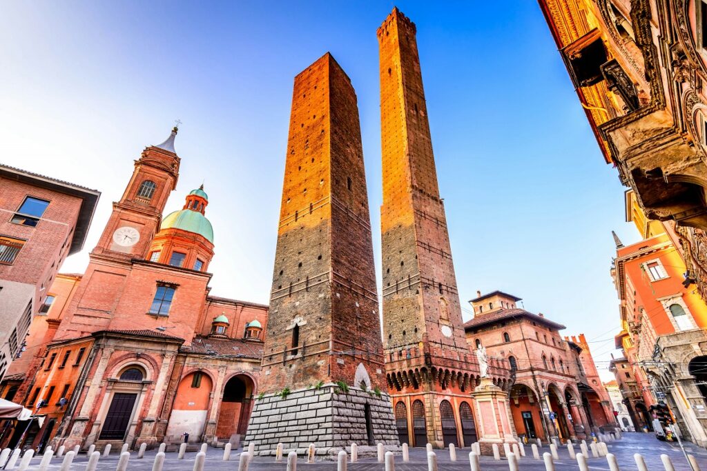 The two towers of Piazza di Porta for Cannabis in Bologna Travel Guide.