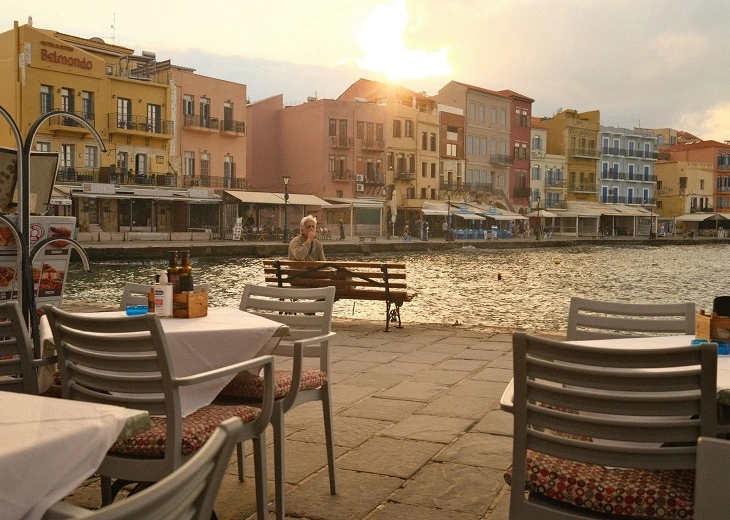 The openness of the old Venetian port changes the risk associated with public use of cannabis in Chania.
