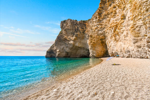 Secluded cove along a beach in Corfu, Greece