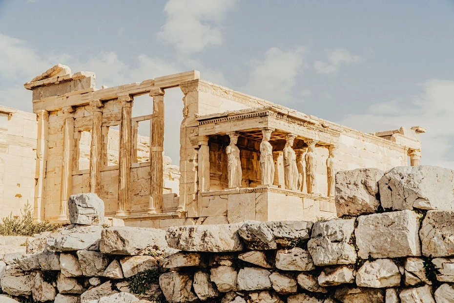 A sunlight illuminated Erechtheion temple at the Acropolis in Athens, Greece.