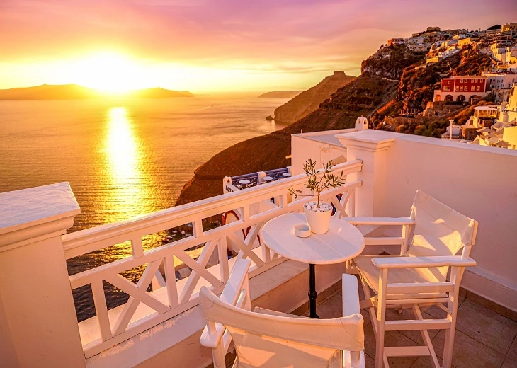 The romantic view of watching the sunset over the Oia caldera appeals to plenty of visitors looking to smoke cannabis in Santorini.